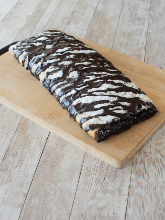 Brownie Pastry on a cutting board on a white table